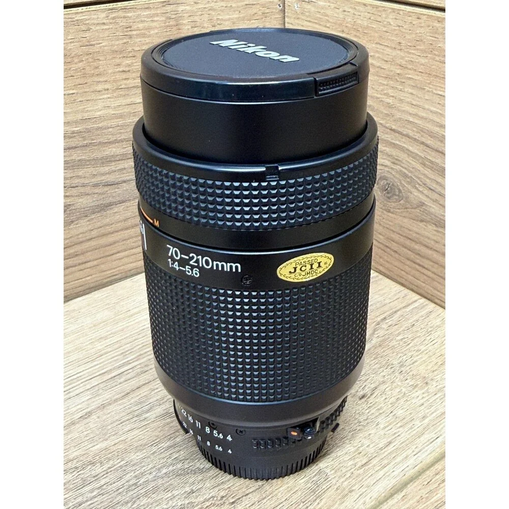 Nikon AF Nikkor 70-210mm 1:4-5.6 Lens w/ Caps Very Good Working Condition